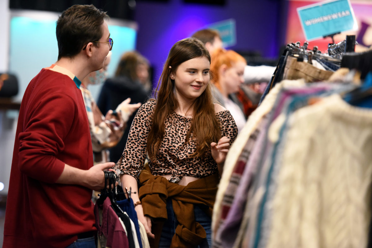 Shoppers browsing at the Vintage Clothing Sale