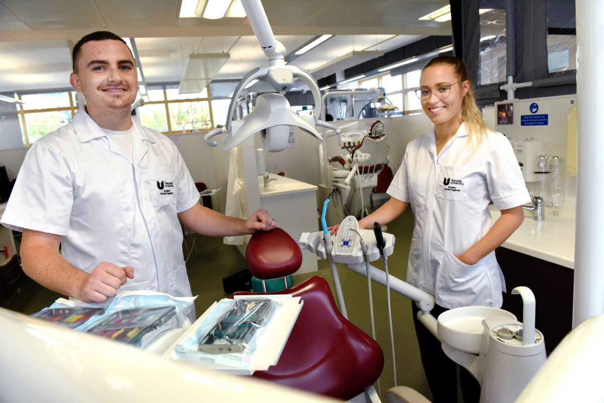 Dental students working in the clinic