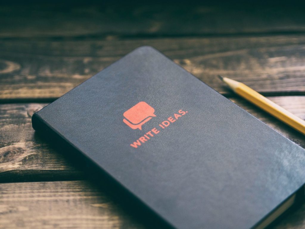 Image of a notebook with a cover that says: "write ideas"