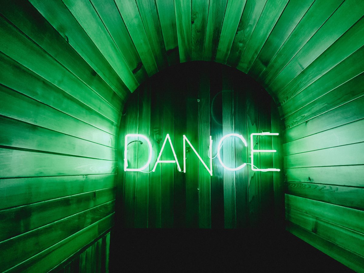 Green neon dance sign