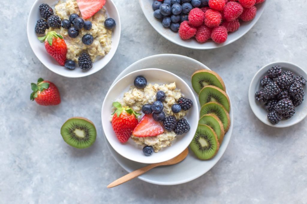 A variety of colourful fruits in breakfast bowls