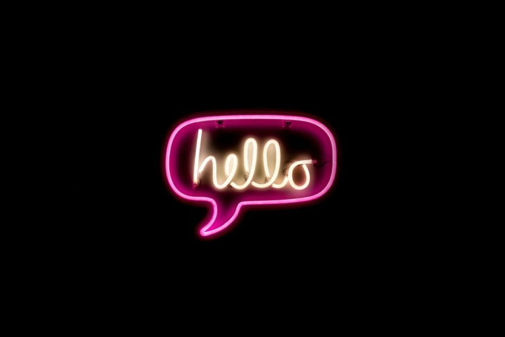 Neon speech bubble saying 'hello'