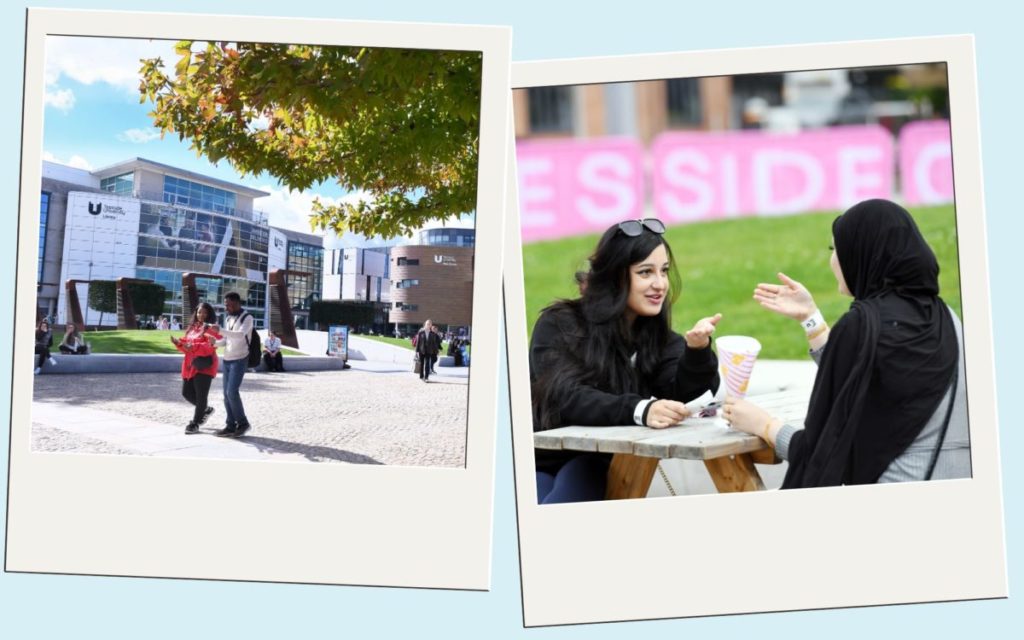 Students sat outside in Campus Heart