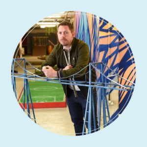 Nick Rodgers stood next to a model of the Transporter Bridge