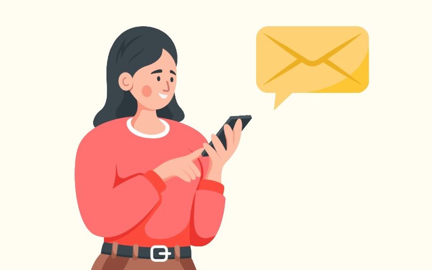 Woman sending a message on her phone