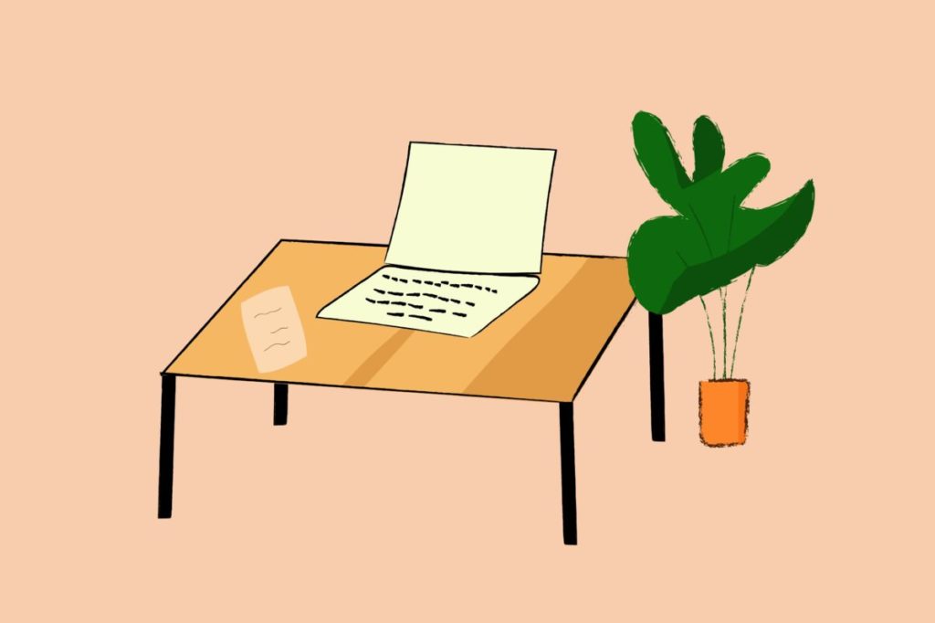 Note paper and laptop on a desk